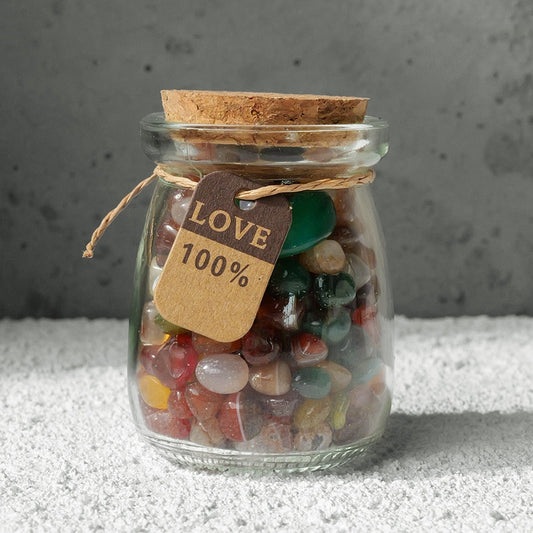 The crystal bottle is placed on the desk in the early morning, with an open schedule book and a cup of coffee beside it, symbolizing the plan for the day.