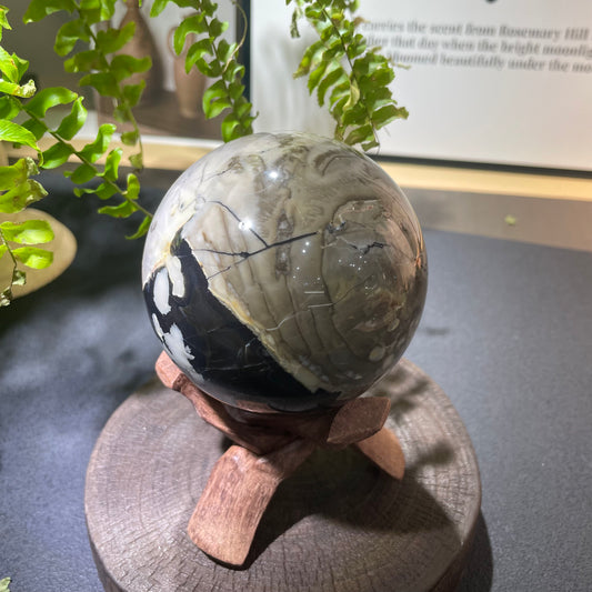 Lava stone polished ball with natural banding