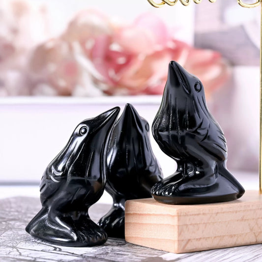Natural obsidian raven carving for protection and wisdom
