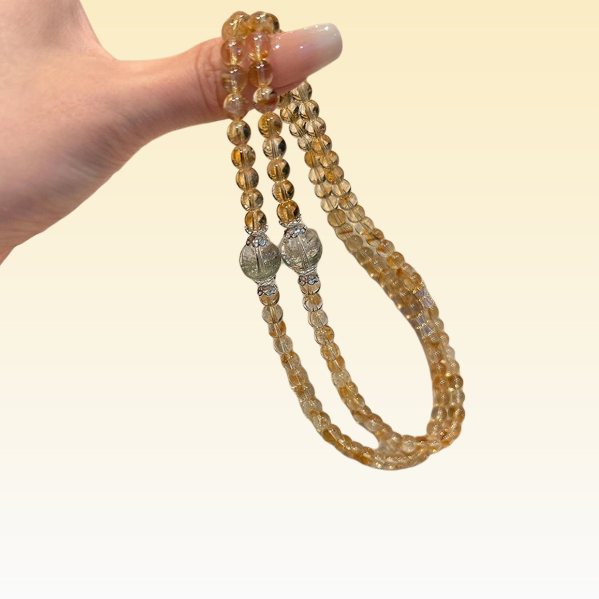 The wealth-themed scene highlights the energy characteristic of attracting both regular income and windfall gains