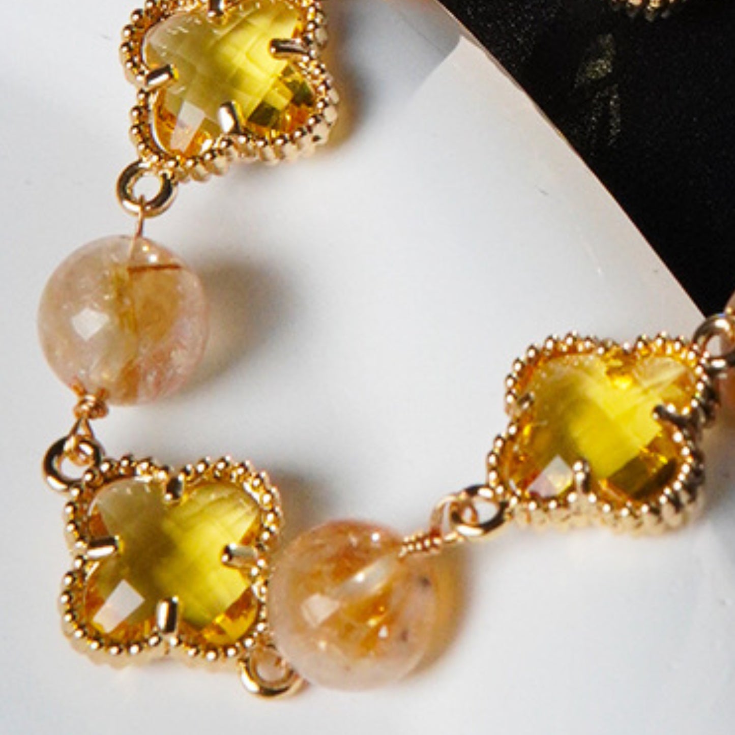 Wearing amethyst in study scenarios helps with academic performance, while yellow tower crystal enhances exam luck