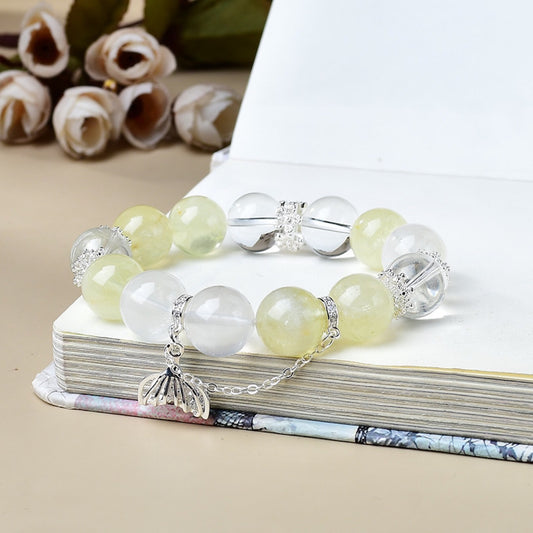 The bracelet is displayed flat, highlighting its dual energy effects of attracting wealth and soothing emotions