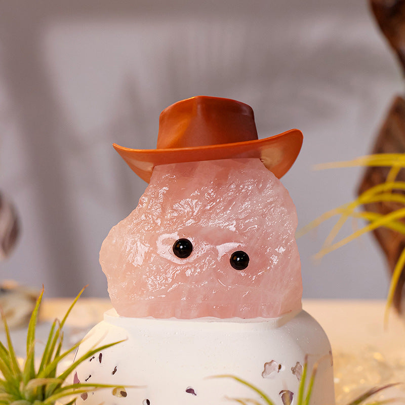 The little hedgehog poked its head out from behind the coffee cup, adding a touch of fun to the morning work.