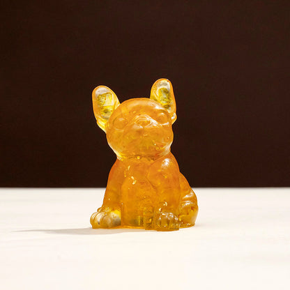 A study space accompanied by a crystal puppy and student stationery