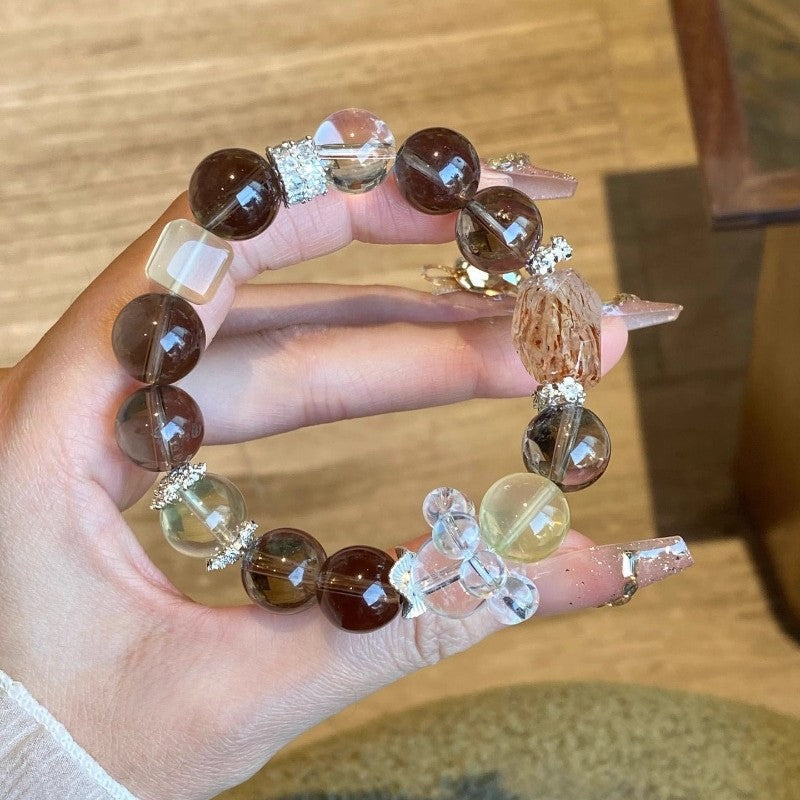 Close-up of the Black Gold Super Seven mineral inclusions, showcasing the energy and comprehensive enhancement effects of the seven minerals