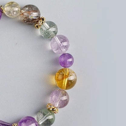 Close-up of the Black Gold Super Seven mineral inclusions, showcasing the energy and protective properties of its seven minerals