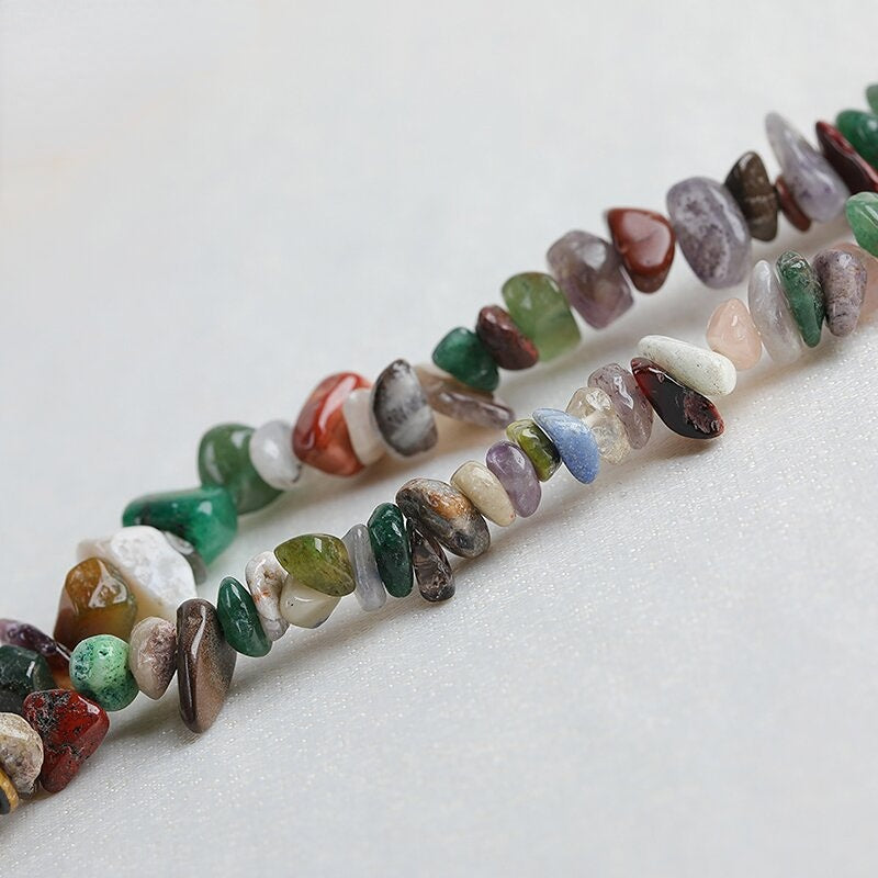 Blue sandstone has perforated and glittering pebbles, which are used to make shiny evening party decorations and daily accessories.