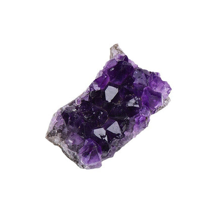 A close-up shot of the sharp crystal tip at the top of the amethyst cluster, serving as the core focus for energy emission and reception, for concentrating the mind during meditation.