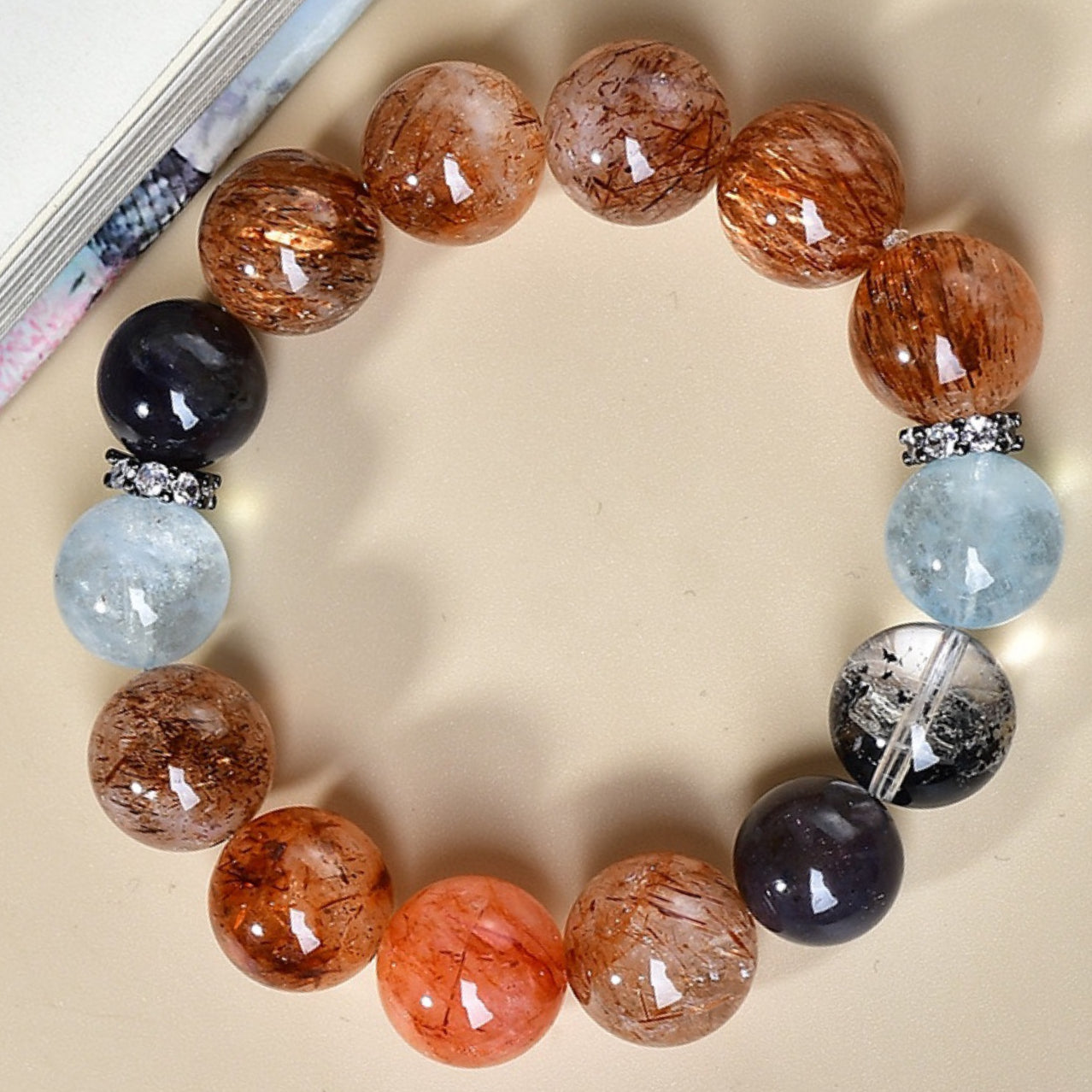 A close-up of cordierite and aquamarine, highlighting the energy combination that enhances intuitive insight and communication skills.