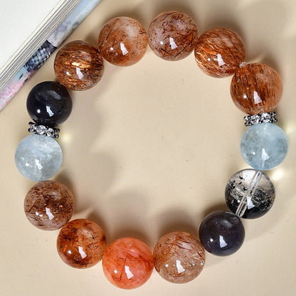 A close-up of cordierite and aquamarine, highlighting the energy combination that enhances intuitive insight and communication skills.