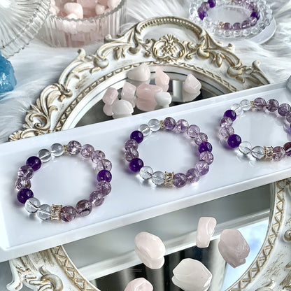 A close-up of the deep purple amethyst, symbolizing the enhancement of intuition and insight