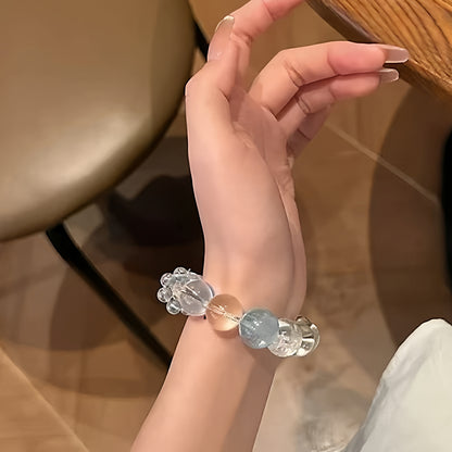 White crystal amplifies inspiration, while aquamarine expresses it clearly. This bracelet is the perfect companion for creative workers at their desks.