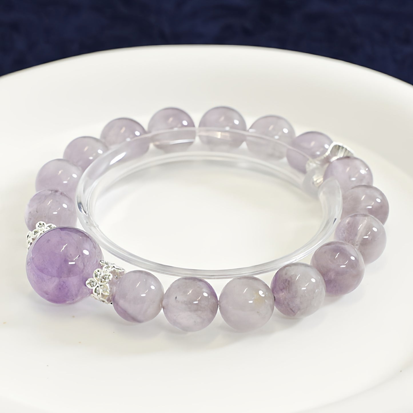 The bracelet is paired with creative tools, and the purple rabbit fur stimulates creativity and intuition