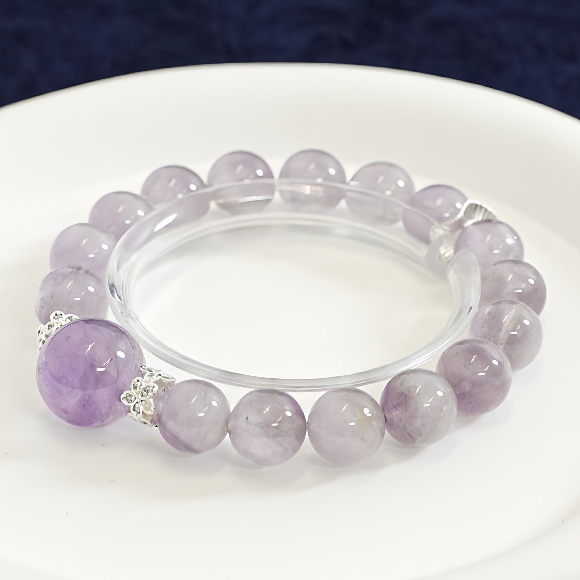 The bracelet is paired with creative tools, and the purple rabbit fur stimulates creativity and intuition