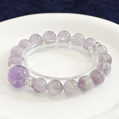 The bracelet is paired with creative tools, and the purple rabbit fur stimulates creativity and intuition