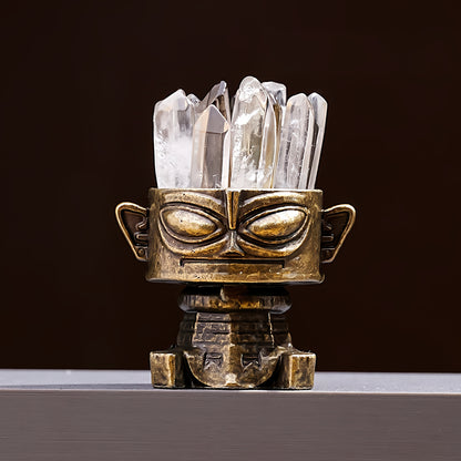 The product is placed in a modern and minimalist living room, creating a strong and harmonious aesthetic contrast with the grey sofa and green plants.