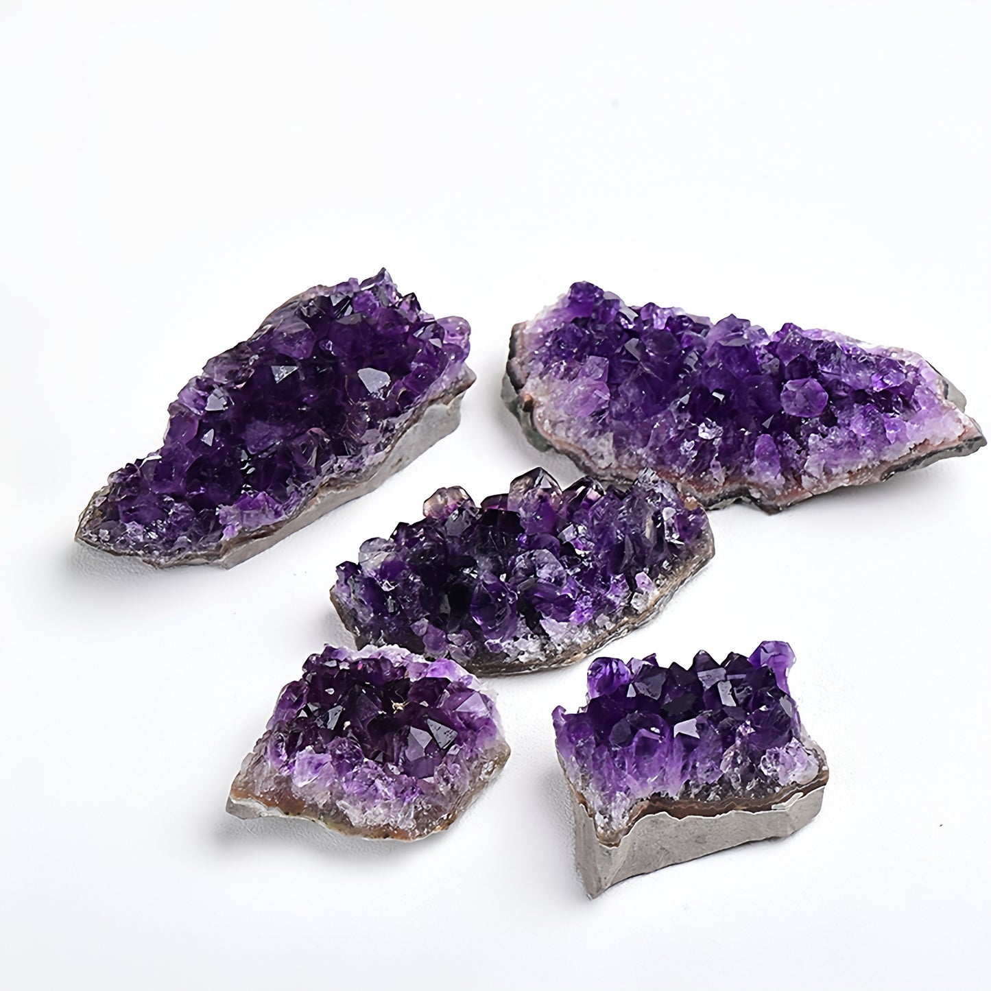 The close-up shows the small crystal cave structure hidden inside the amethyst cluster, symbolizing its boundless energy treasure and mysterious power.
