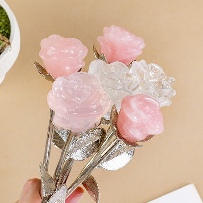 A close-up of the "Eternal Realm" white crystal rose is shown in the morning light. The light penetrates the petals, revealing the natural ice cracks and clouds inside.
