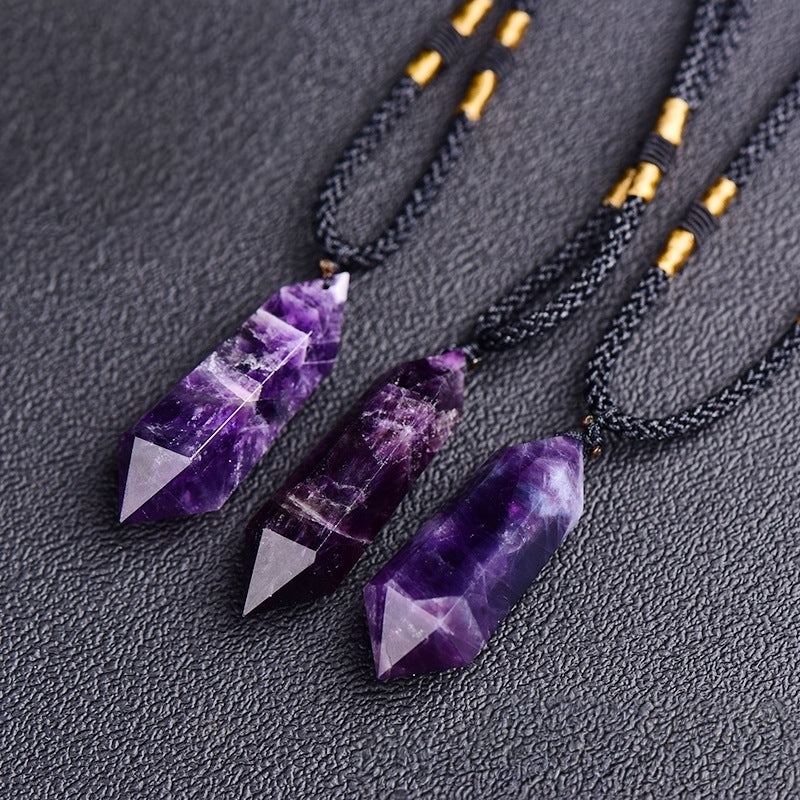 The back details of the amethyst pendant showcase the smooth polishing process and natural texture