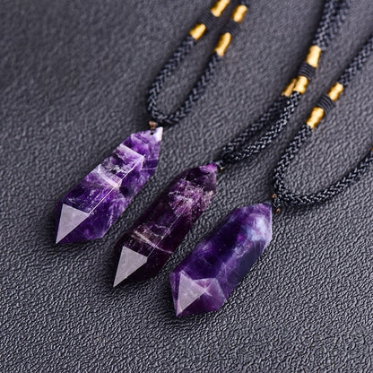 The back details of the amethyst pendant showcase the smooth polishing process and natural texture