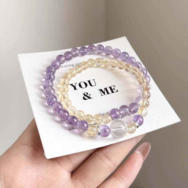 The alternating display of yellow and purple crystals symbolizes energy balance and harmonious integration