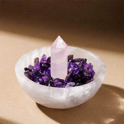 The Moroccan Selenite bowl with raw Clear Quartz captured in soft light, highlighting its texture and beauty as a core energy management tool.
