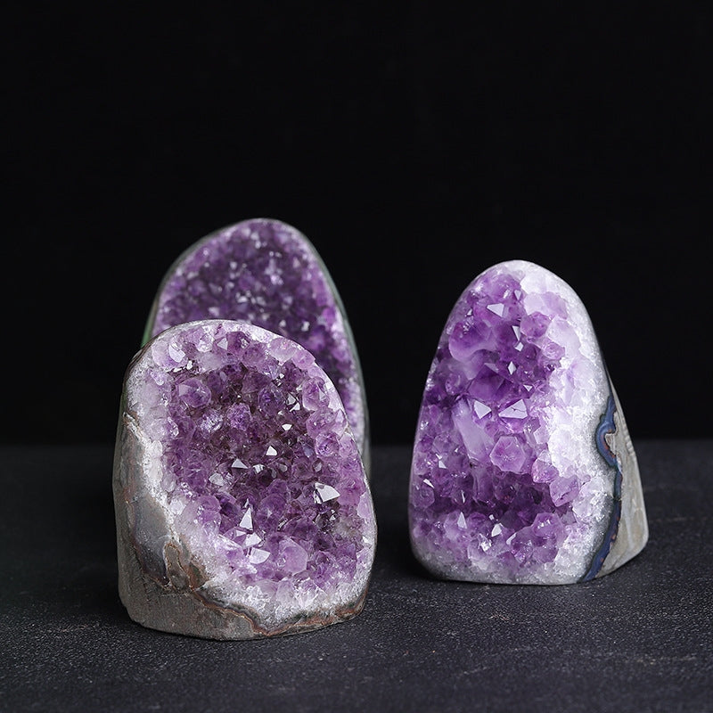 The panoramic display of the "Energy Temple" Uruguayan amethyst cluster showcases its deep purple color and majestic church structure, symbolizing its powerful energy reception and purification capabilities.