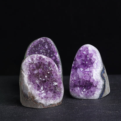 The panoramic display of the "Energy Temple" Uruguayan amethyst cluster showcases its deep purple color and majestic church structure, symbolizing its powerful energy reception and purification capabilities.