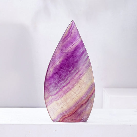 Take a top-down shot of the flame sculpture to show its three-dimensional energy structure