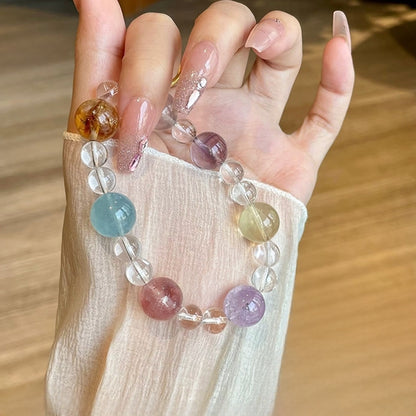 The Duobao bracelet, worn on the wrist, in an office setting, symbolizes protecting entrepreneurs to attract wealth and energy and achieve success in their careers.