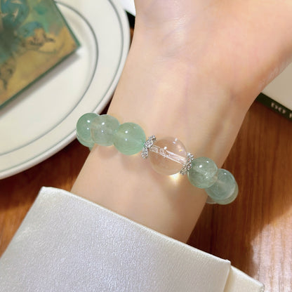 The gentle energy display of green fluorite symbolizes emotional balance and stress relief