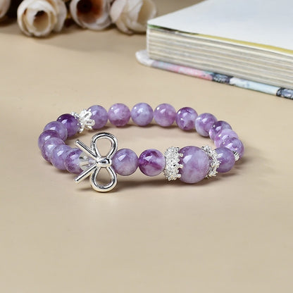 A scene picture of wearing a bracelet showcases its effects of emotional healing and spiritual comfort