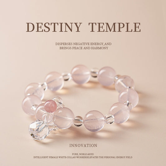 A close-up of the gradient design of rose crystal and white crystal showcases the perfect blend of soft pink and pure white