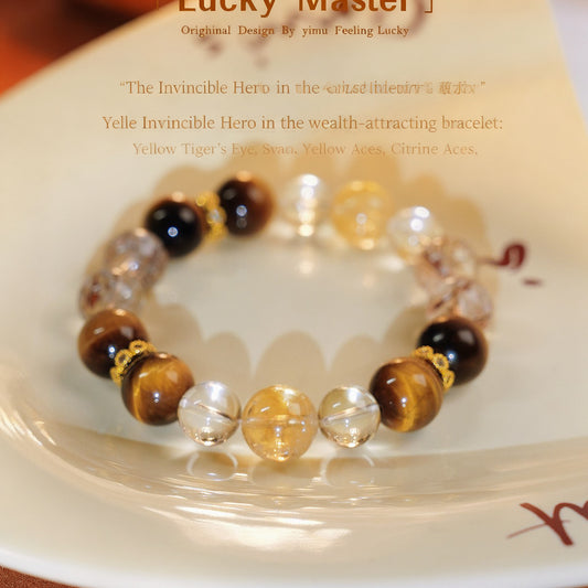 The four major crystals, yellow tiger's Eye, Asestle, citrine and Black Gold Super Seven, are displayed in series, presenting a complete energy protection system