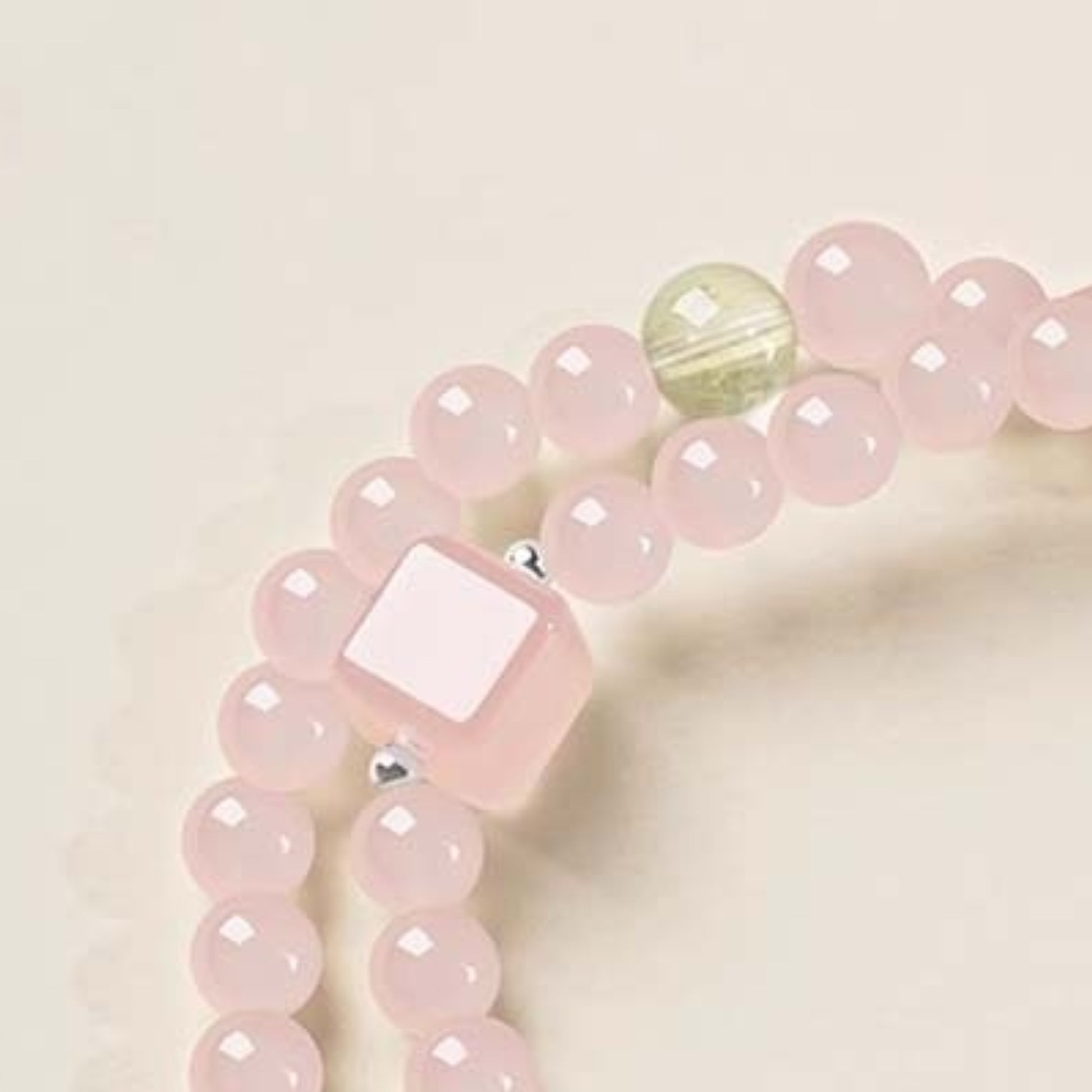 A close-up of the transparent texture of natural rose crystal, with the natural texture inside clearly visible