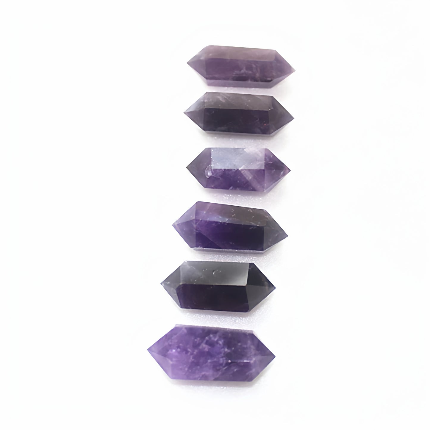 A beautifully packaged amethyst pendant is ready to be given as a gift