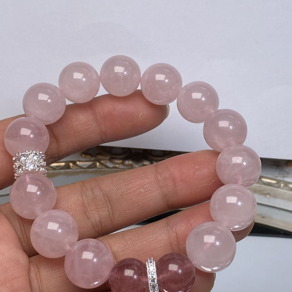 The gentle energy display of rose quartz symbolizes the opening of the heart chakra and the healing of emotional wounds