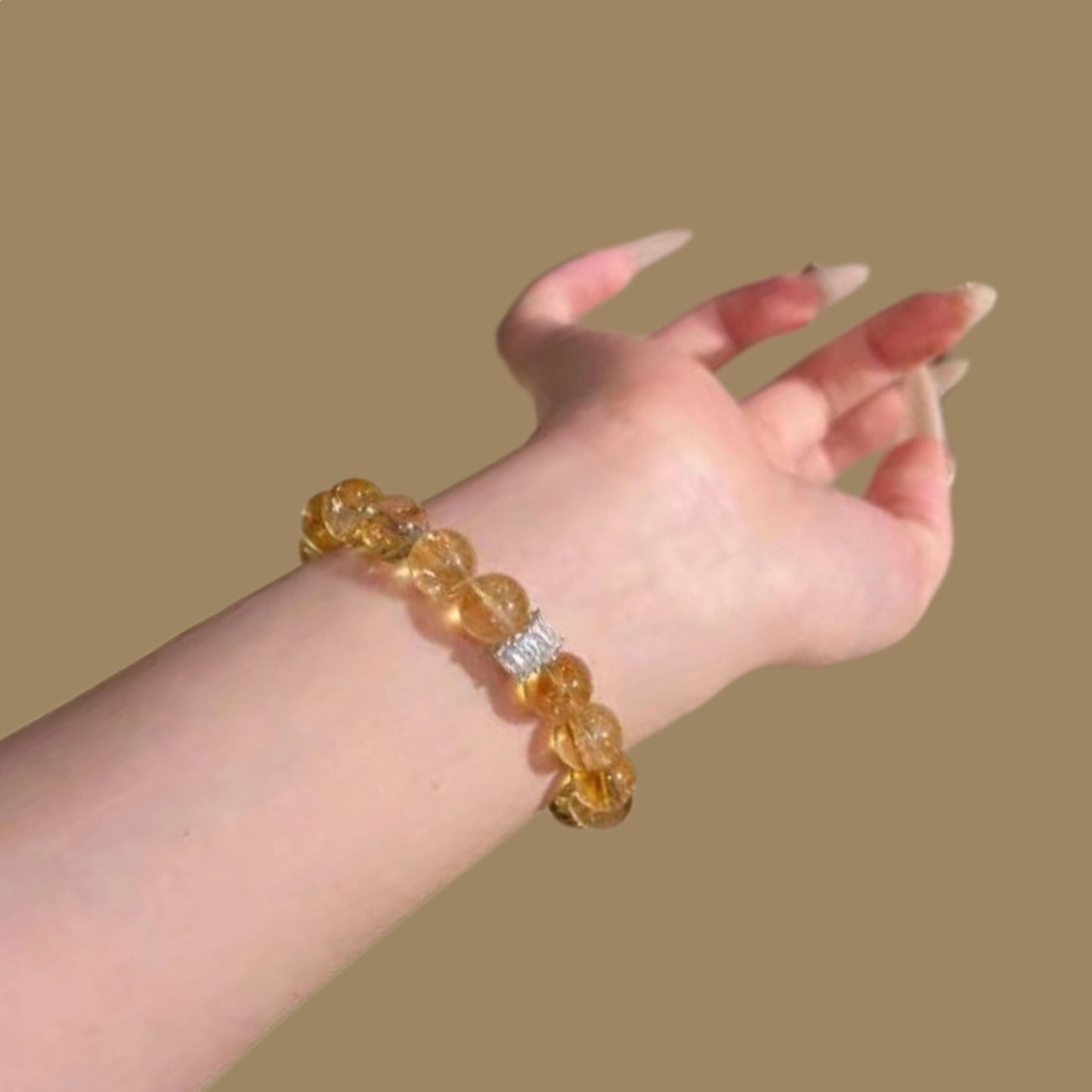 A close-up of the iridescent effect of the yellow Asai stone beads, showcasing their high-frequency energy and vibration enhancement characteristics