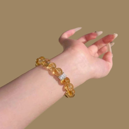 A close-up of the iridescent effect of the yellow Asai stone beads, showcasing their high-frequency energy and vibration enhancement characteristics