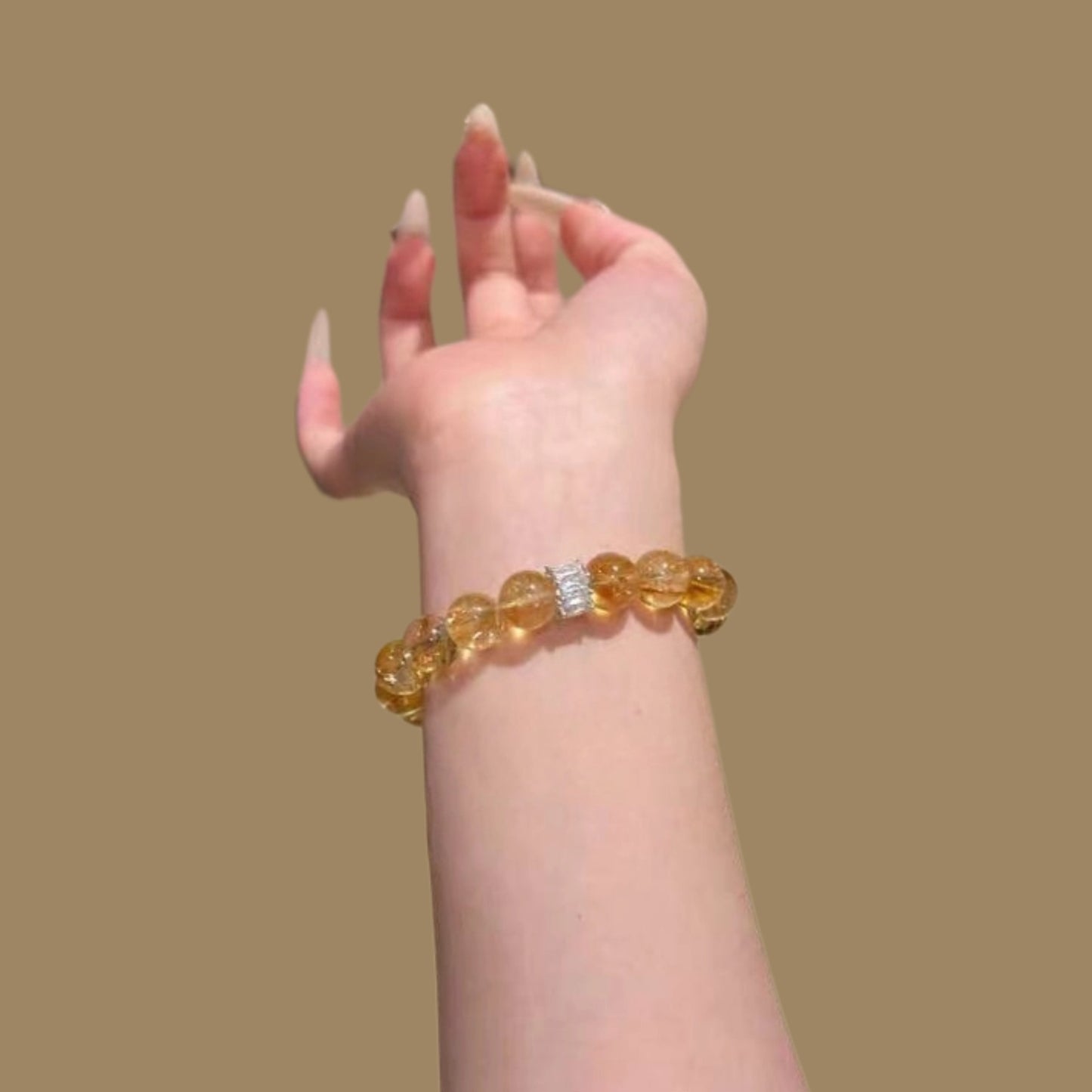 A close-up of the metallic luster of the yellow Asai stone beads, showcasing their energy characteristics of activating personal strength and enhancing confidence