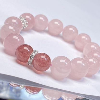 A panoramic view of the natural Madagascar rose quartz bracelet, showcasing the unique jelly-like texture and soft pink luster