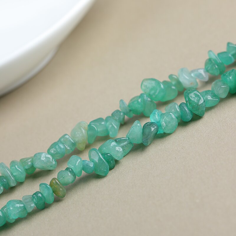 Malachite is a perforated patterned crushed stone, designed for unique artistic jewelry and healing accessories.