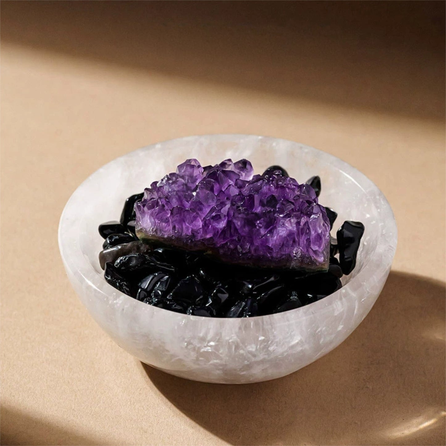 The Aura Sanctuary bowl as a centerpiece on a modern living room coffee table with books and a plant.