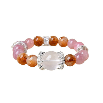 The multi-treasure beaded loop design symbolizes the continuous flow of wealth energy