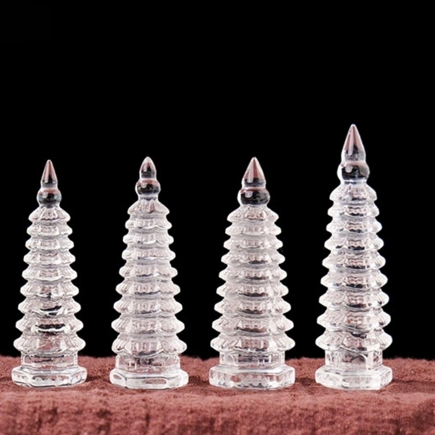 The tower serves as the core decoration of the home office, with a background of simple walls and green plants.