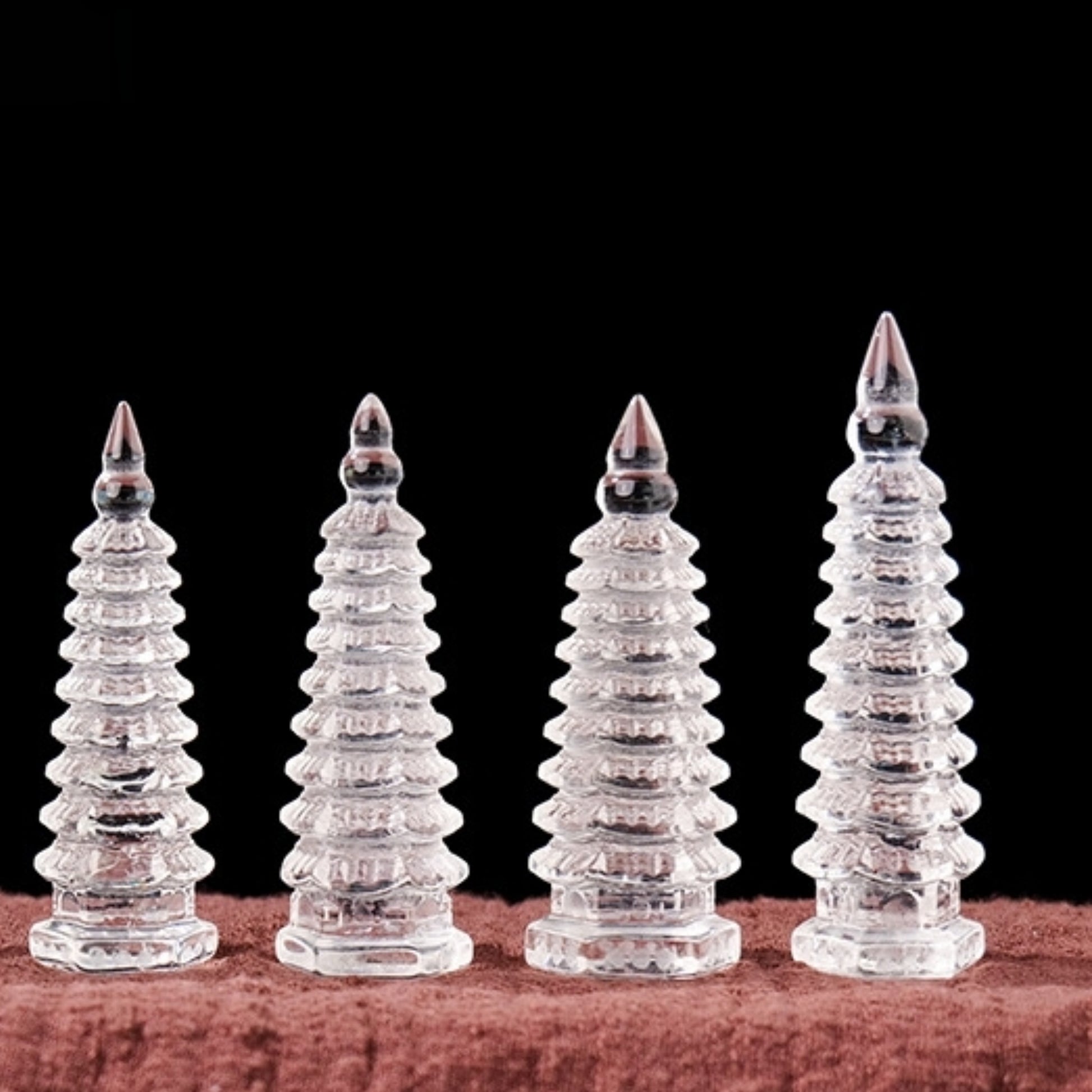 The tower serves as the core decoration of the home office, with a background of simple walls and green plants.