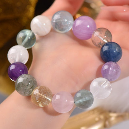 The bracelet made of unpolished aquamarine, green ghost and yellow tower crystal raw stones emphasizes its pure energy and the beauty of natural wildness.