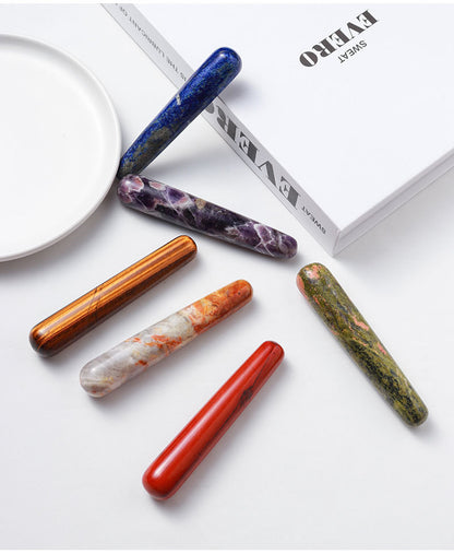 Bedtime ritual: A massage stick, meditation candles and a diary create a warm atmosphere together