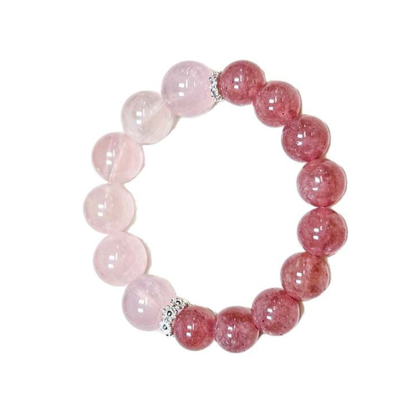 The original beaded design of the display bracelet, with rose quartz and strawberry crystal interlaced, resembles sweet energy candies, brimming with joy.