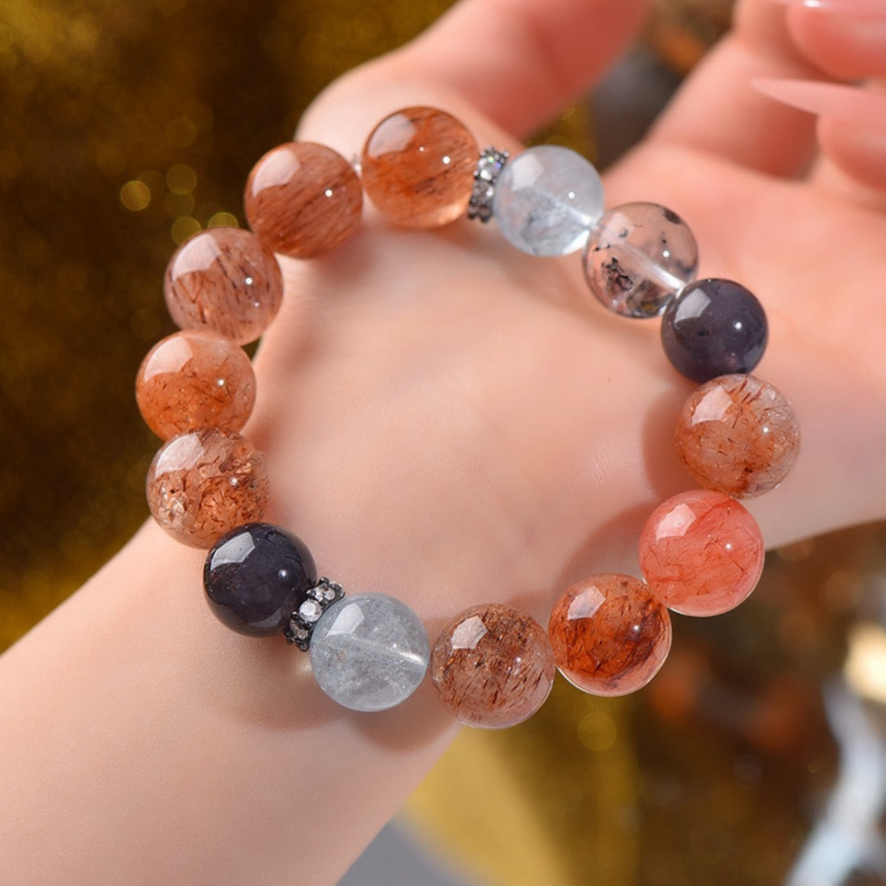 A close-up of the powerful protective energy of Black Gold Super Seven, highlighting its ability to ward off evil spirits, dispel negative energy and purify negative magnetic fields.